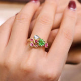 Tsavorite Trillion Cut Brushed Finish Ring with Sapphire in 18K Gold