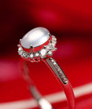 Icy Jade Cabochon & Diamond Halo Ring in 18K White Gold