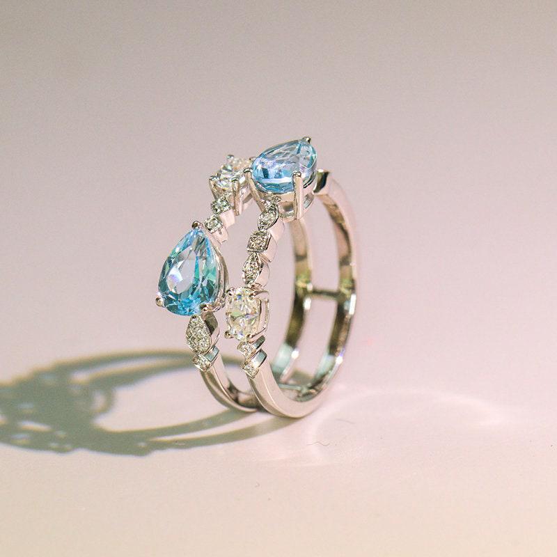 4ct Blue Topaz & Diamonds Ring - 18K White Gold