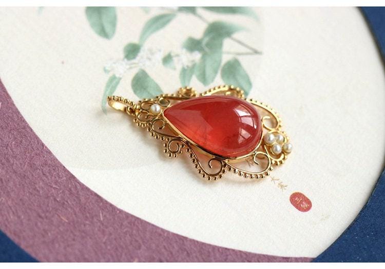 Rhodochrosite 12x17mm & Akoya Baby Pearl Pendant in 18K Yellow Gold