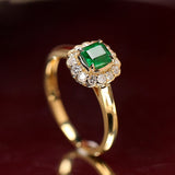 Vintage-Inspired Emerald & Diamond Halo Ring in 18K Yellow Gold