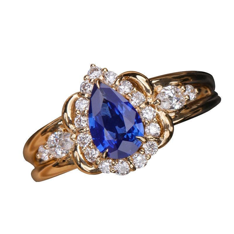 Cornflower Blue Sapphire Teardrop 18K Gold Ring with Diamonds