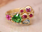 Tsavorite Trillion Cut Brushed Finish Ring with Sapphire in 18K Gold