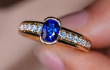 Channel Set Half Bezel Sapphire Eternity Ring in 18K Yellow Gold