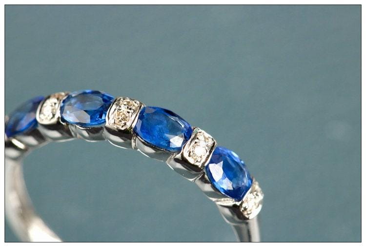 Four Blue Sapphire & Chaneel Diamond Ring in 18K White Gold