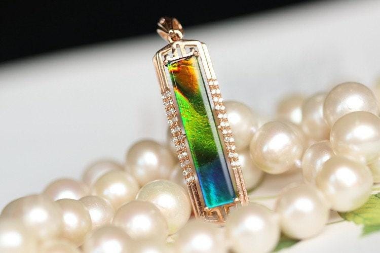 25x5mm Ammolite & Halo Diamond Pendant in 18K Yellow Gold