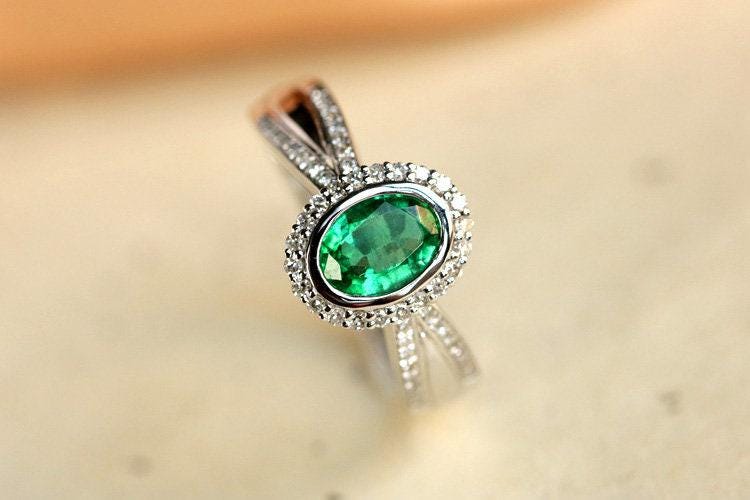 Emerald Oval Cut & Diamond Ring in 18K White Gold