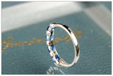 Four Blue Sapphire & Chaneel Diamond Ring in 18K White Gold