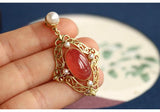Hollow Out Design Rhodochrosite 18K Yellow Gold Pendant set with Akoya Pearl