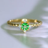 Tsavorite Asscher Cut & Diamond Twisted Ring in 18K Gold