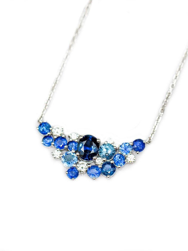 Blue Sapphire & Diamond Cluster Necklace in 18K White Gold