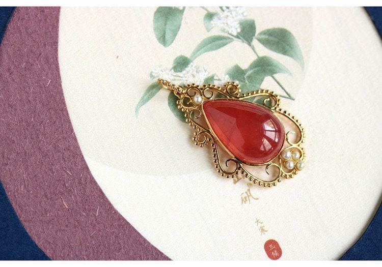 Rhodochrosite 12x17mm & Akoya Baby Pearl Pendant in 18K Yellow Gold