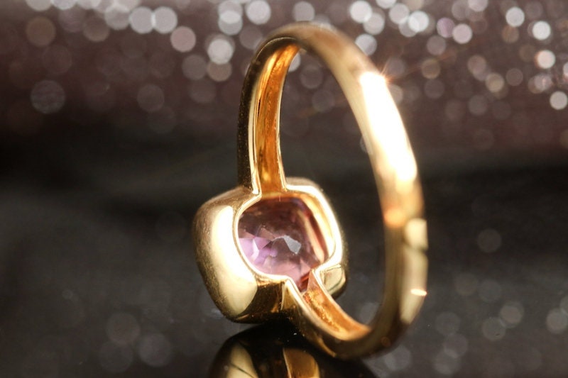 1.1ct Pinkish Cushion Bezal Set Ring in 18K Yellow Gold