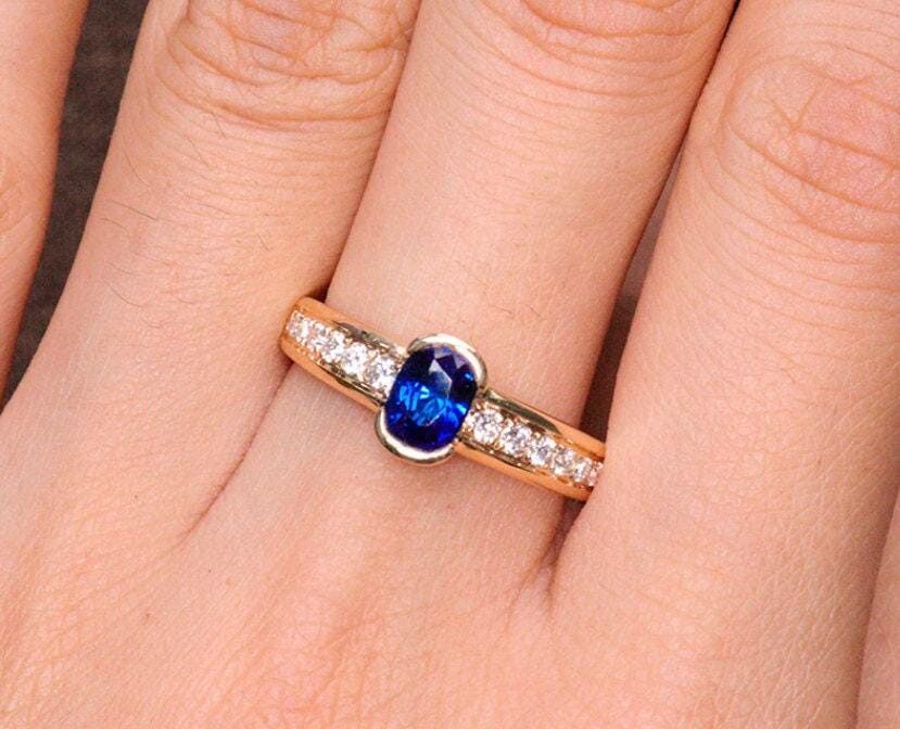 Channel Set Half Bezel Sapphire Eternity Ring in 18K Yellow Gold