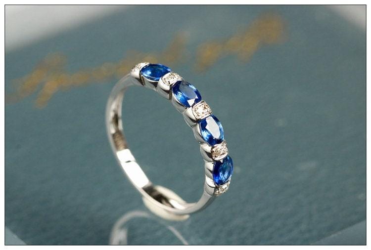 Four Blue Sapphire & Chaneel Diamond Ring in 18K White Gold