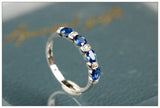 Four Blue Sapphire & Chaneel Diamond Ring in 18K White Gold