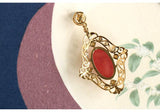 Hollow Out Design Rhodochrosite 18K Yellow Gold Pendant set with Akoya Pearl