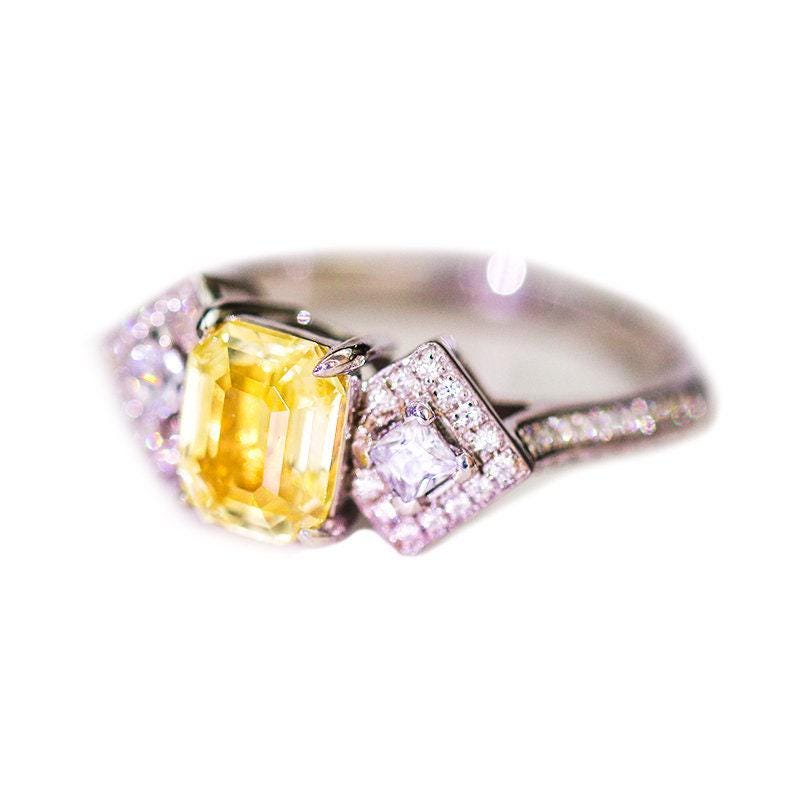 1.3ct Yellow Sapphire 18K Gold Ring with Diamonds