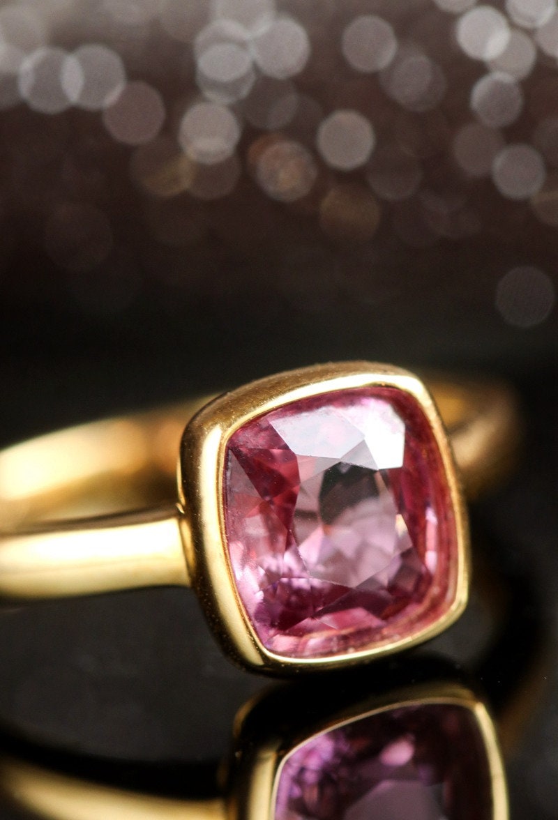 1.1ct Pinkish Cushion Bezal Set Ring in 18K Yellow Gold
