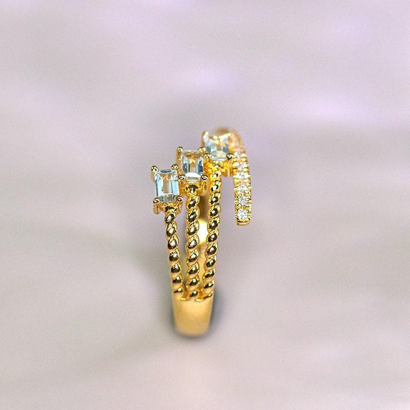 Granulation Design Aquamarine Ring with Diamonds – 18K Gold