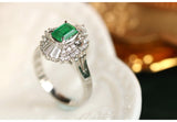 1.02ct Emerald & Diamond Ballerina Ring in 18K White Gold