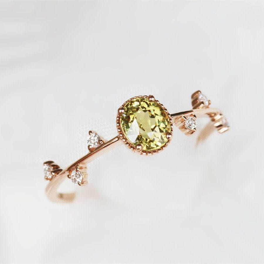 1.2ct Oval Mali Garnet & Diamond Cluster Ring in 18K Yellow Gold