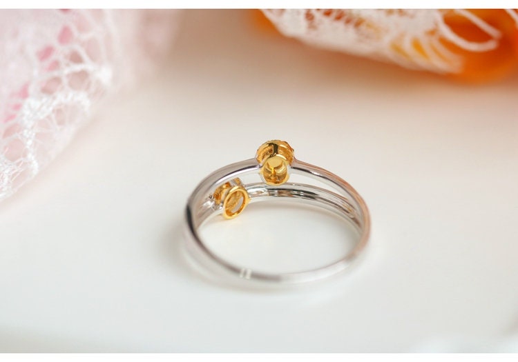 Two Fancy Yellow Diamonds Oval Ring in 18K Yellow Gold