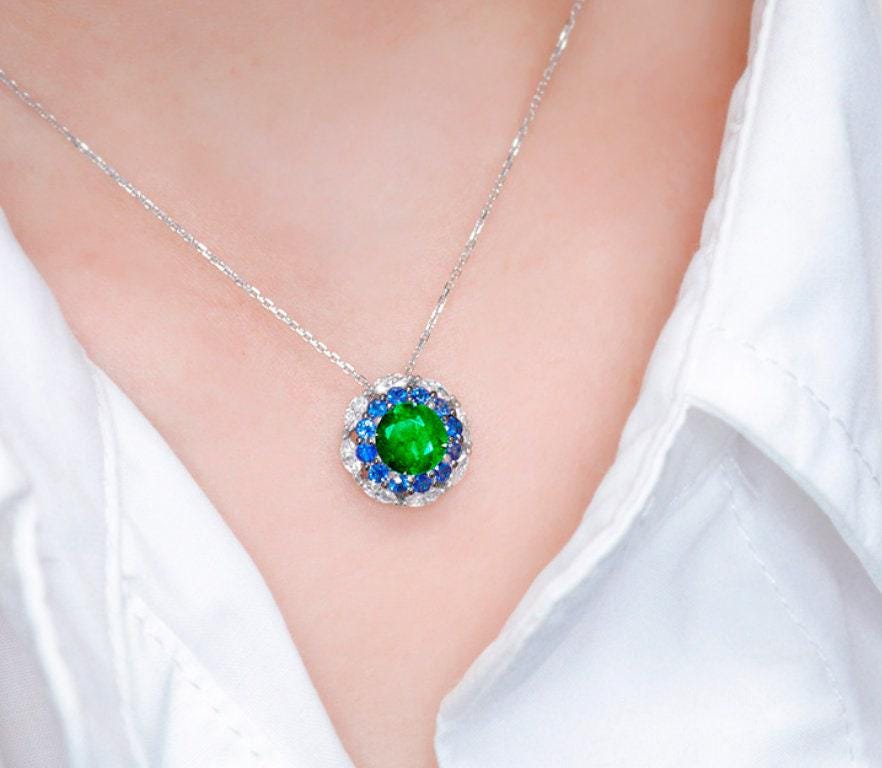 Emerald & Sapphire Halo Set Diamond Ring in 18K White Gold