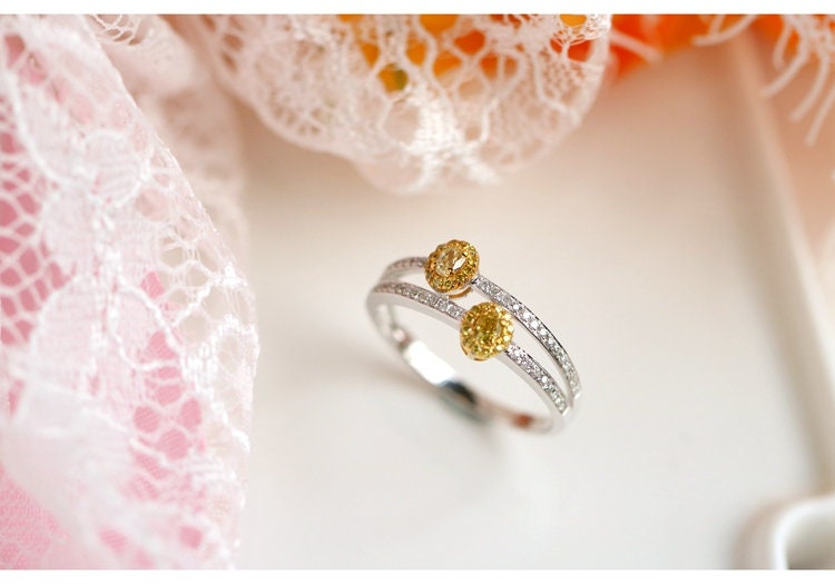 Two Fancy Yellow Diamonds Oval Ring in 18K Yellow Gold