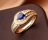 Cornflower Sapphire 18K Gold Twisted Ring with Free Form Design