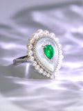 Emerald Teardrop-Shaped Ring with Baby Pearl in 18K White Gold