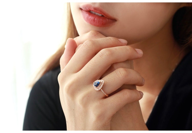 Blue Sapphire Teardrop Ring with Halo Diamonds - 18K White Gold
