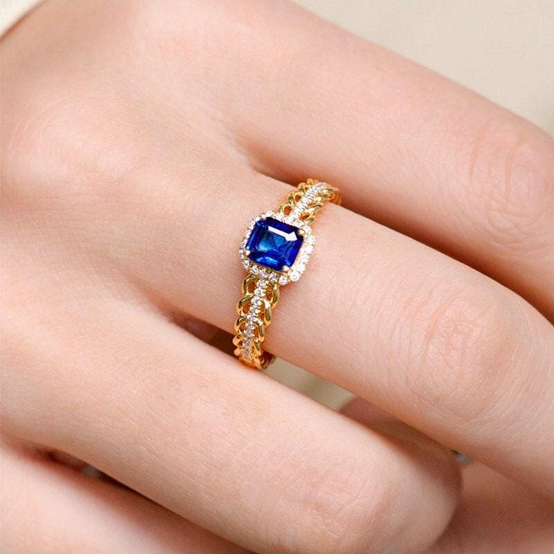 Emerald Cut Blue Sapphire & Diamonds Ring in 18K Yellow Gold