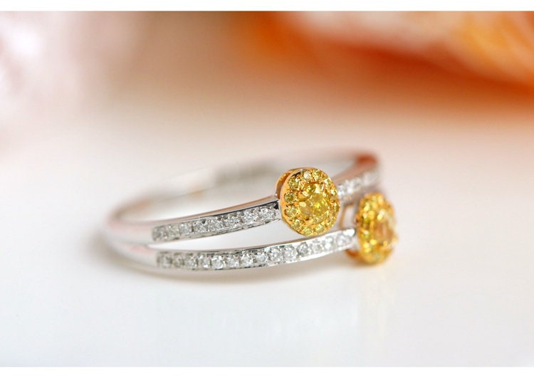 Two Fancy Yellow Diamonds Oval Ring in 18K Yellow Gold